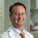 Dr. Damon Raskin