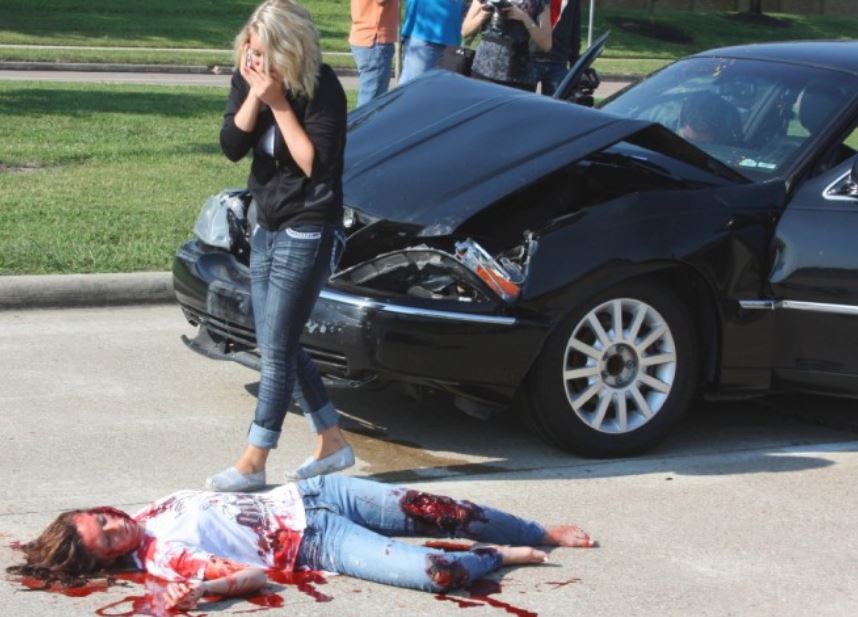 -Law Officer Falber in recorded scene of Prom night car accident.